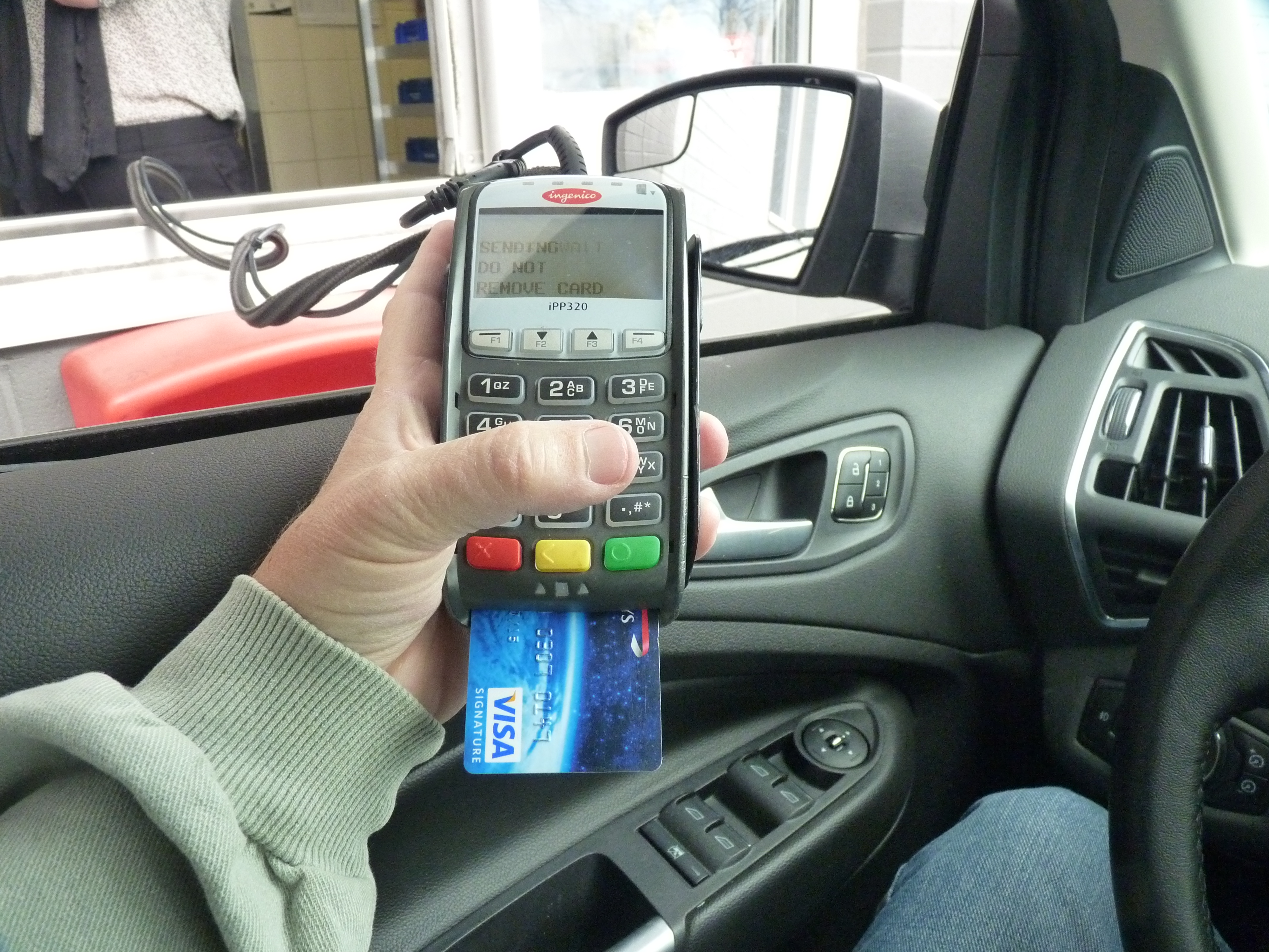 This is how they do it in Canadian fast food drive-thrus.