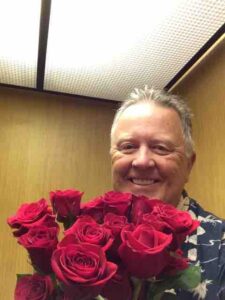 randy with roses
