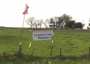 Lonetree Creek Racepark sign