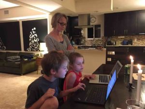 astrid-mitch-doing-homework-on-laptops