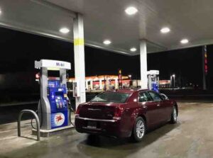 chrysler 300 car at gas station