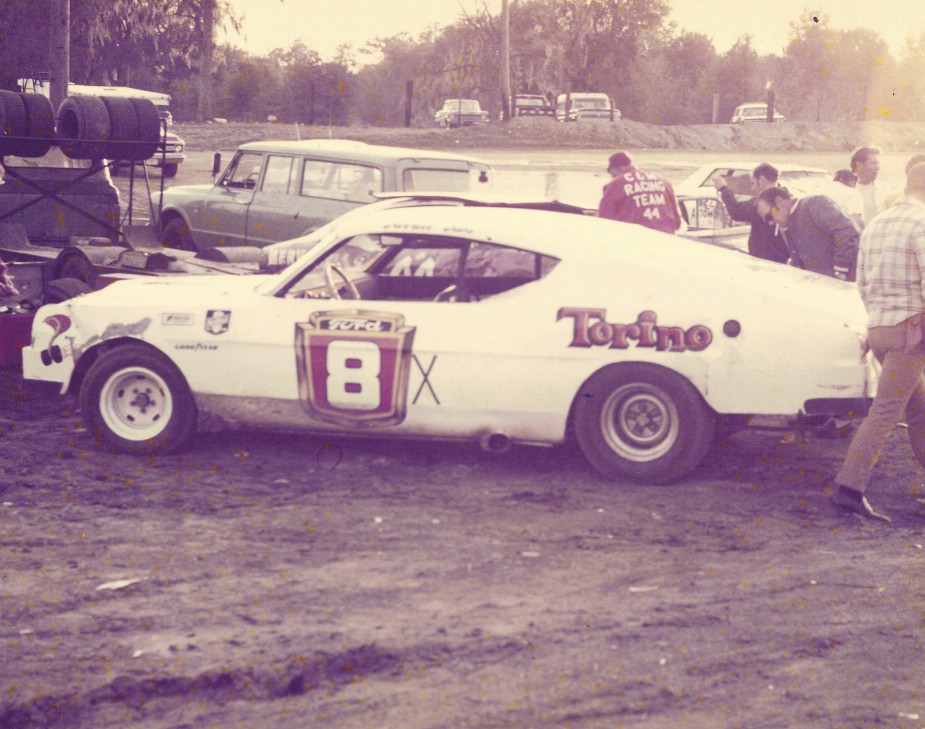 This was at the Deland Speedway at the 1972 Florida Winter Nationals. That's Darrell leaning over the right rear quarter panel of the trusty Torino. He won the Florida Winter Nationals at least one year. Leading dirt short track stars from all over showed up for the multi-day open competition event. (Bill Virt photo)