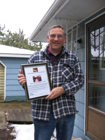Ed with his "Cheese Challenge" award.