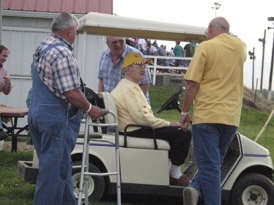 Fans and crew at a party in Darrell's honor.