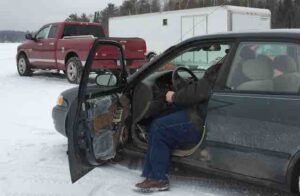 old car on ice lake